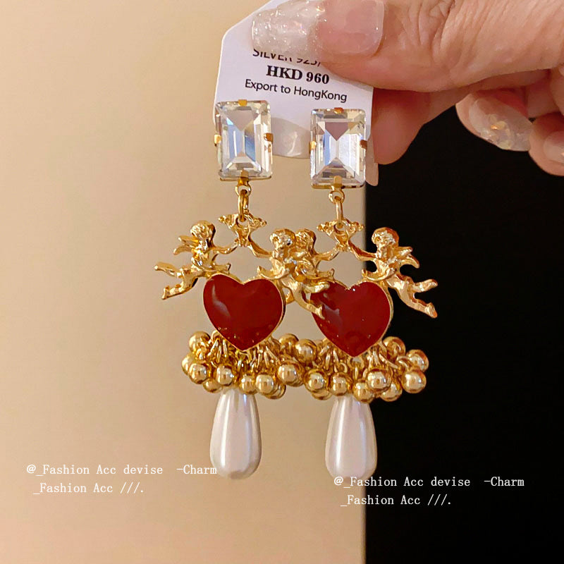 Women's Ancient Ornament Sier Needle Oil Dripping Earrings