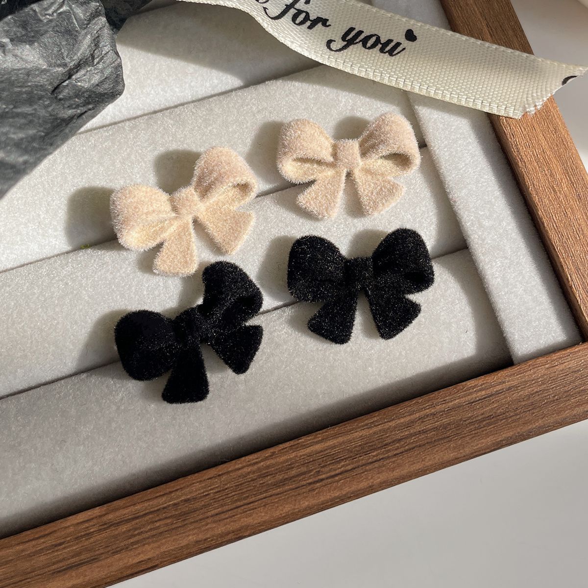 Black Petal Simple Flocking Bow Female Sier Earrings