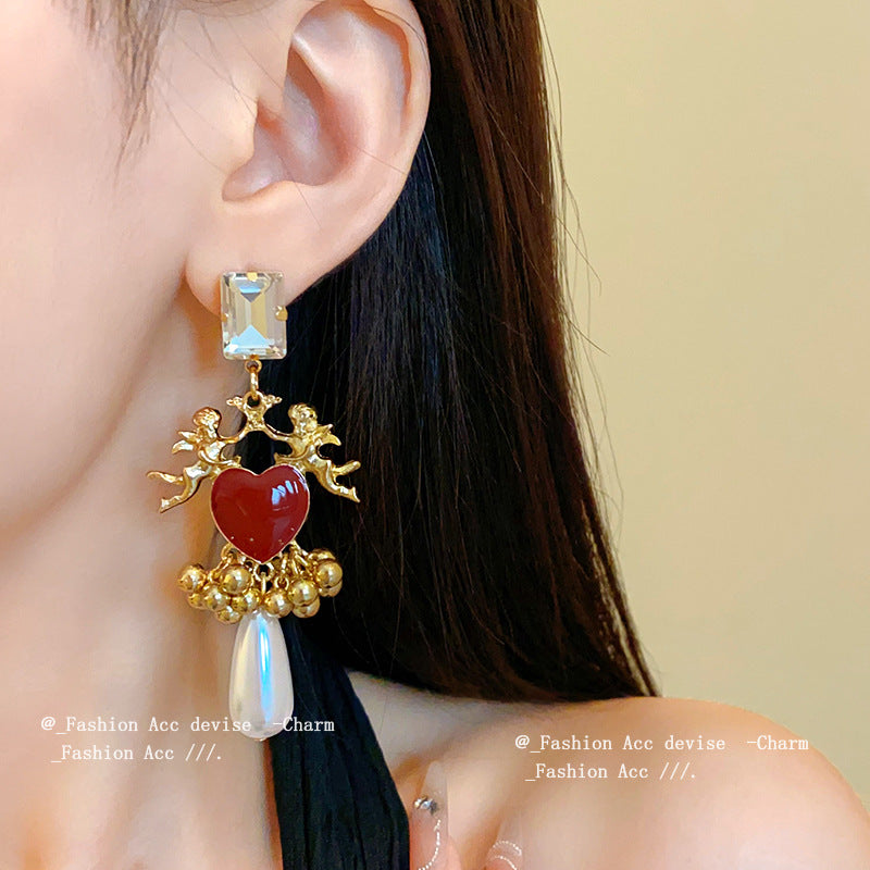 Women's Ancient Ornament Sier Needle Oil Dripping Earrings