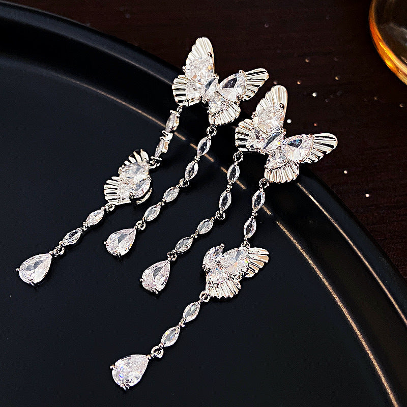 Women's Personality Butterfly Tassel Sier Needle Face Slimming Earrings