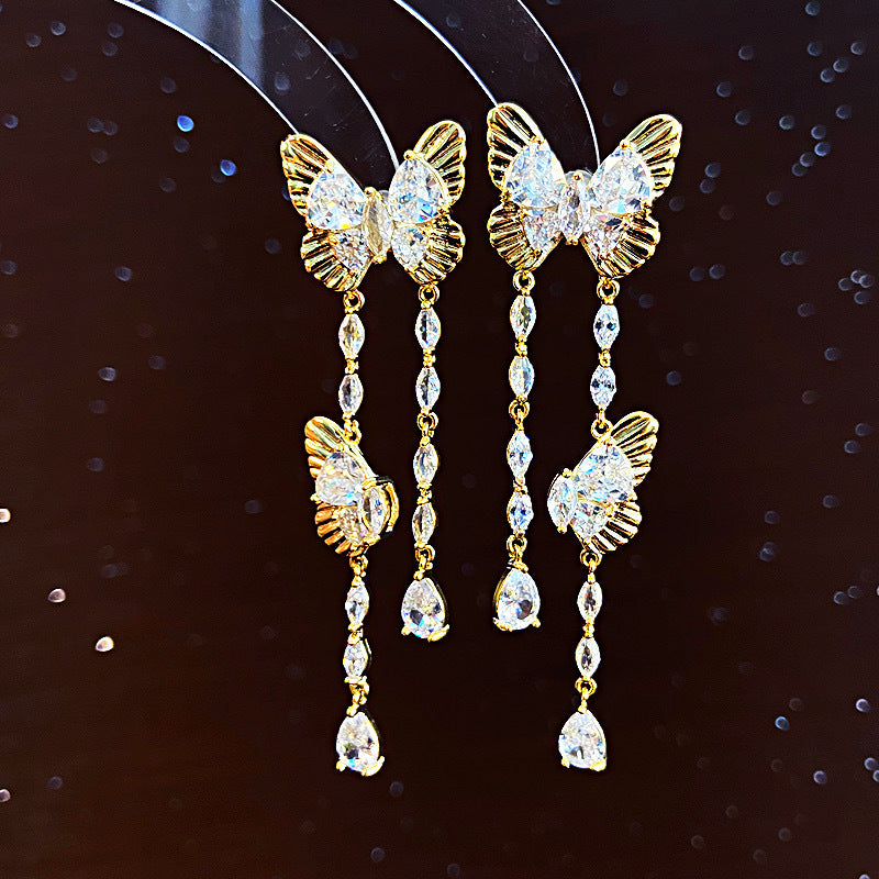 Women's Personality Butterfly Tassel Sier Needle Face Slimming Earrings